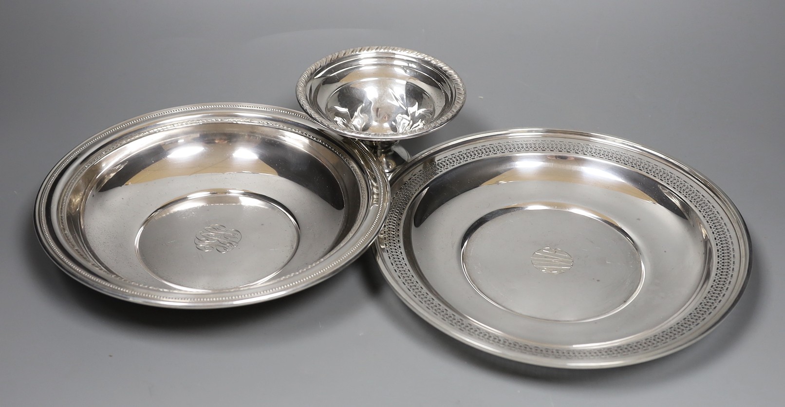 A pierced sterling shallow dish or stand, 24.5cm, a similar bowl and small pedestal dish